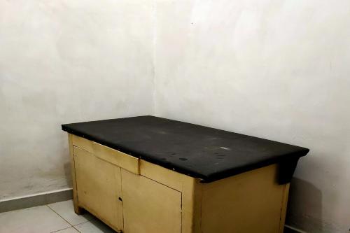 Imagen general del Hotel OYO 90699 Yellow White Guesthouse Palu. Foto 7