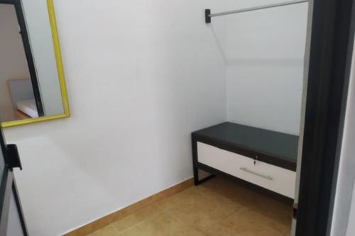 Imagen general del Hotel OYO 90699 Yellow White Guesthouse Palu. Foto 10