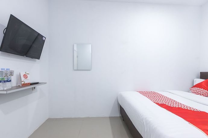 Imagen de la habitación del Hotel OYO 907 Wisma Cakung. Foto 2