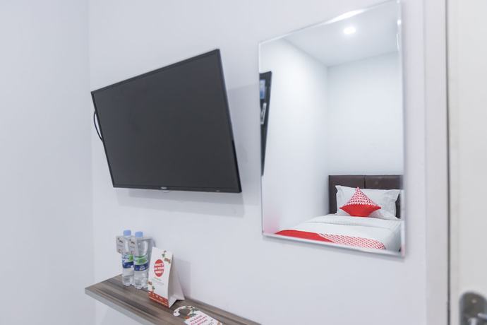 Imagen de la habitación del Hotel OYO 907 Wisma Cakung. Foto 3