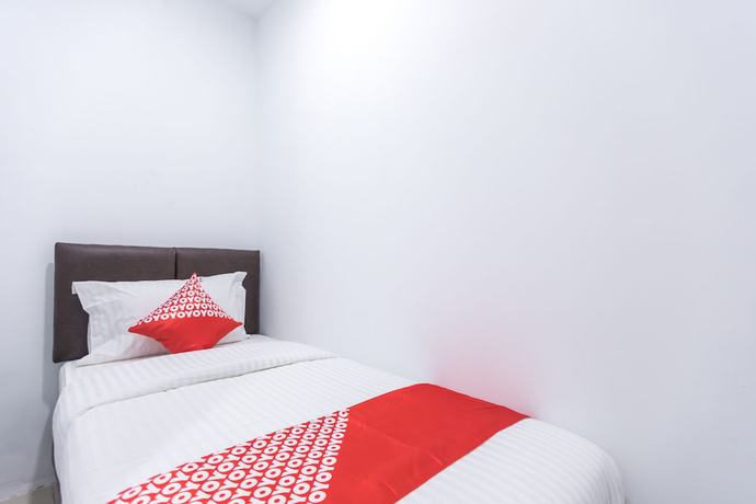 Imagen de la habitación del Hotel OYO 907 Wisma Cakung. Foto 4