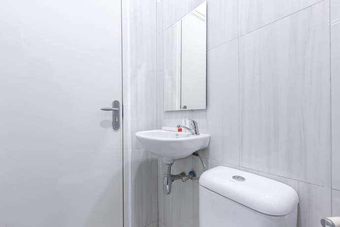 Imagen de la habitación del Hotel OYO 907 Wisma Cakung. Foto 5