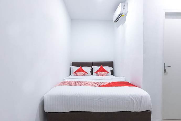 Imagen de la habitación del Hotel OYO 907 Wisma Cakung. Foto 6