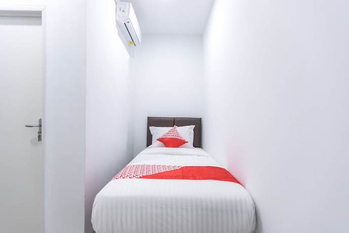 Imagen de la habitación del Hotel OYO 907 Wisma Cakung. Foto 7