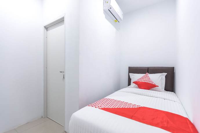 Imagen de la habitación del Hotel OYO 907 Wisma Cakung. Foto 8