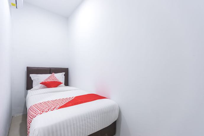 Imagen de la habitación del Hotel OYO 907 Wisma Cakung. Foto 10