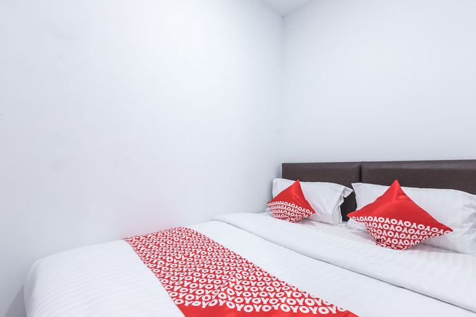 Imagen de la habitación del Hotel OYO 907 Wisma Cakung. Foto 12