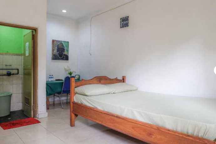 Imagen de la habitación del Hotel OYO 90714 Umah Pande Tabanan Near Tanah Lot. Foto 6