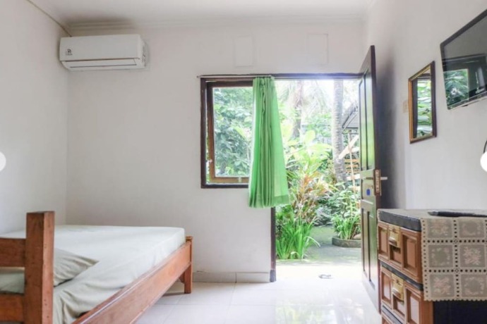 Imagen de la habitación del Hotel OYO 90714 Umah Pande Tabanan Near Tanah Lot. Foto 11