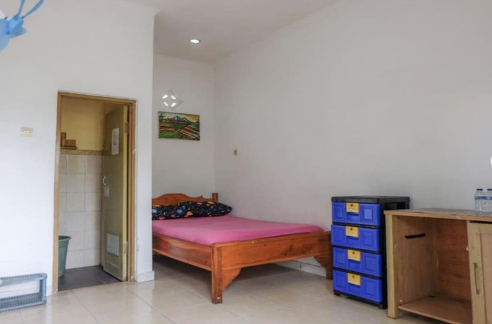 Imagen de la habitación del Hotel OYO 90714 Umah Pande Tabanan Near Tanah Lot. Foto 12