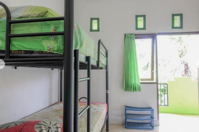 Imagen de la habitación del Hotel OYO 90714 Umah Pande Tabanan Near Tanah Lot. Foto 14