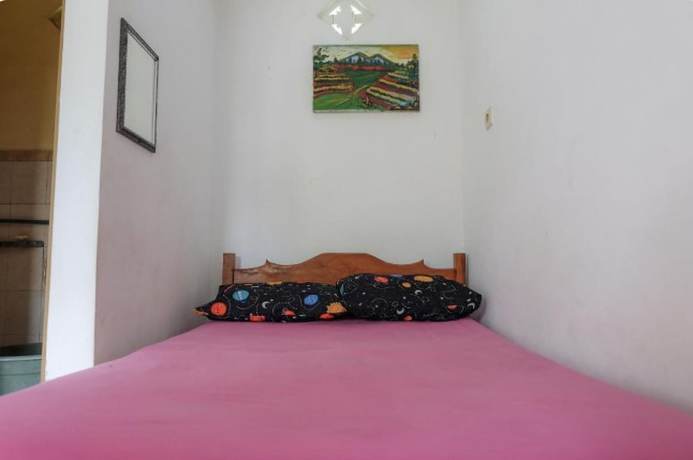 Imagen de la habitación del Hotel OYO 90714 Umah Pande Tabanan Near Tanah Lot. Foto 15