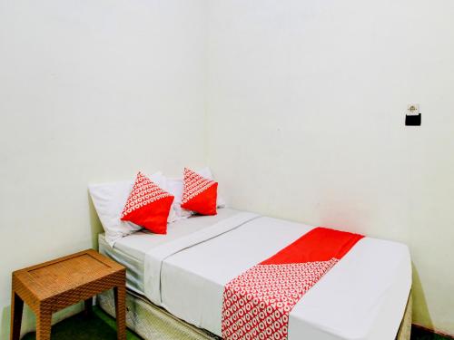 Imagen de la habitación del Hotel OYO 90725 Zeevanna Guest House Syariah. Foto 20