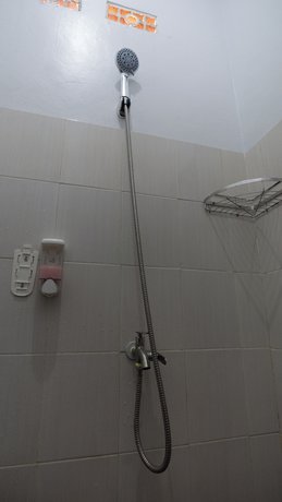 Imagen de la habitación del Hotel OYO 90730 Padekosan. Foto 8