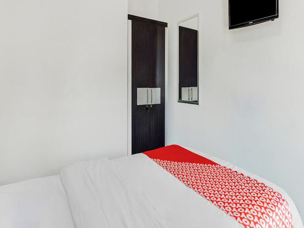 Imagen de la habitación del Hotel OYO 90730 Padekosan. Foto 13