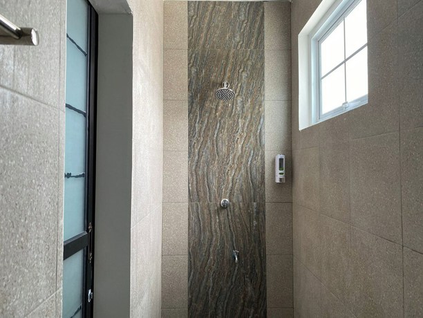 Imagen de la habitación del Hotel OYO 90730 Padekosan. Foto 14