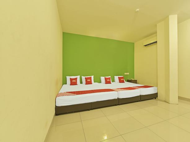 Imagen de la habitación del Hotel OYO 90733 Parkway Inn. Foto 2