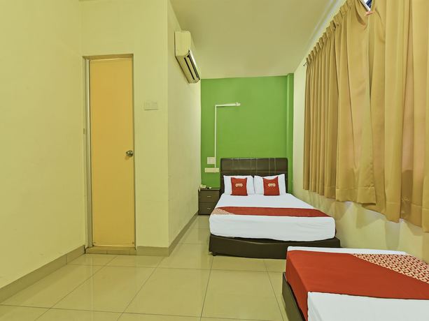 Imagen de la habitación del Hotel OYO 90733 Parkway Inn. Foto 5