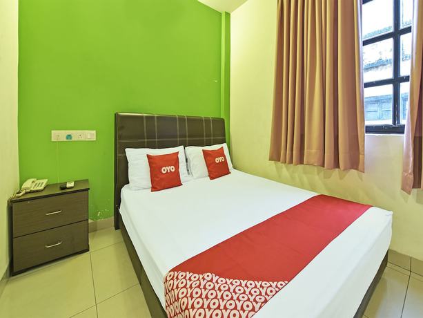 Imagen de la habitación del Hotel OYO 90733 Parkway Inn. Foto 7