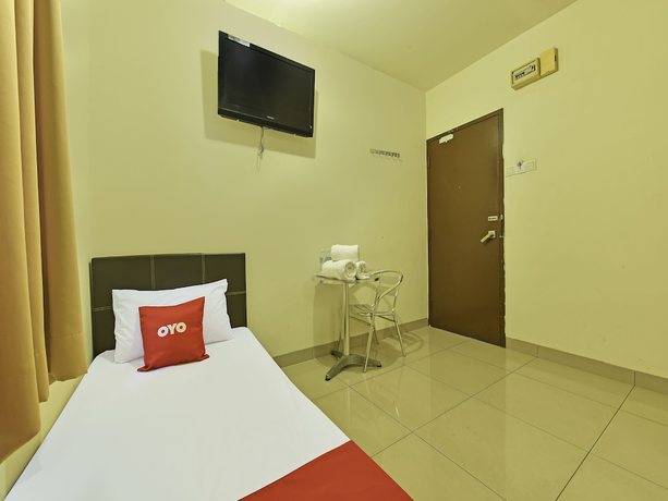 Imagen de la habitación del Hotel OYO 90733 Parkway Inn. Foto 8
