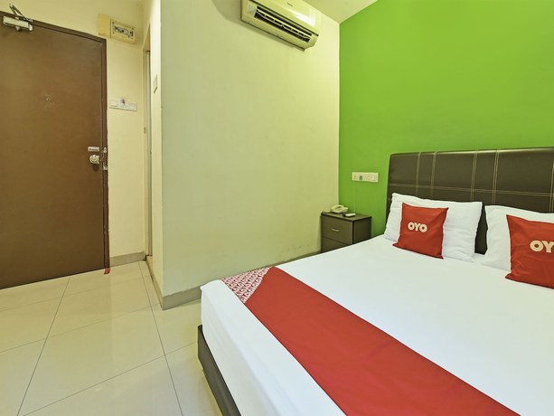 Imagen de la habitación del Hotel OYO 90733 Parkway Inn. Foto 11