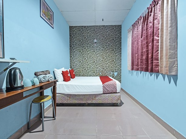 Imagen de la habitación del Hotel OYO 90736 Lh Resak Motel. Foto 4