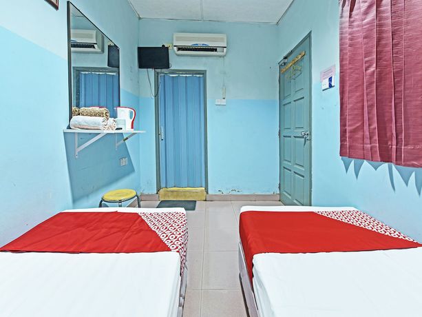 Imagen de la habitación del Hotel OYO 90736 Lh Resak Motel. Foto 5