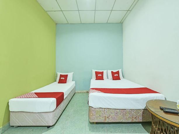 Imagen de la habitación del Hotel OYO 90736 Lh Resak Motel. Foto 6