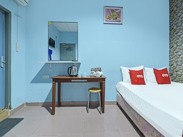 Imagen de la habitación del Hotel OYO 90736 Lh Resak Motel. Foto 8