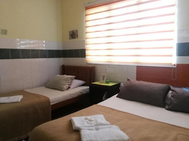 Imagen de la habitación del Hotel OYO 90762 Fs Dimensi. Foto 2