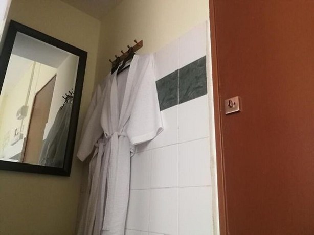 Imagen de la habitación del Hotel OYO 90762 Fs Dimensi. Foto 3