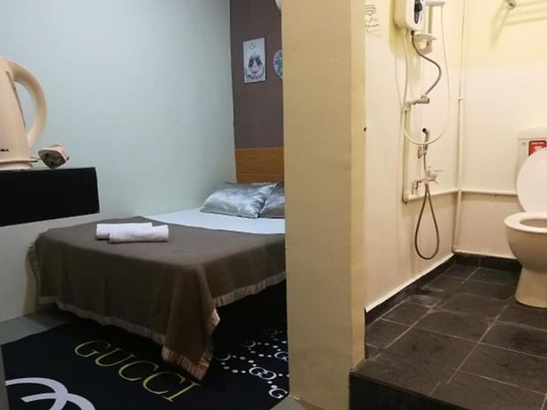 Imagen de la habitación del Hotel OYO 90762 Fs Dimensi. Foto 4