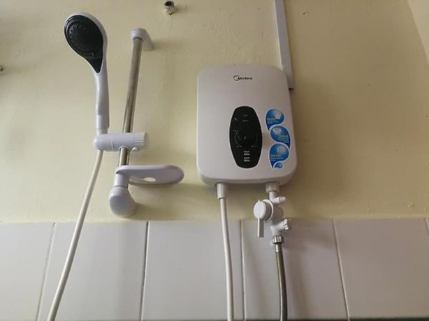 Imagen de la habitación del Hotel OYO 90762 Fs Dimensi. Foto 5