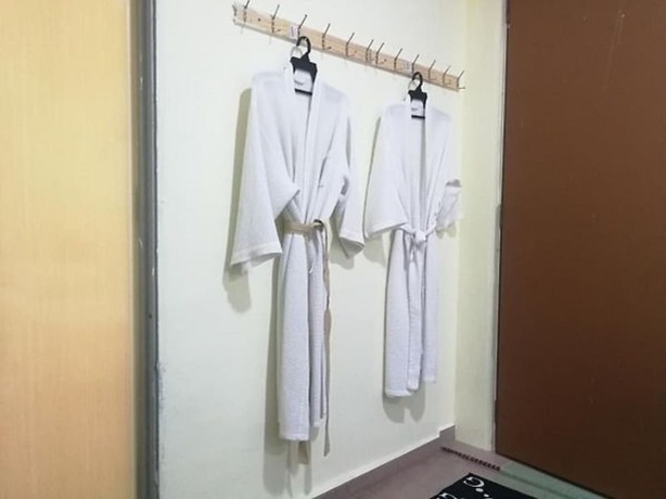 Imagen de la habitación del Hotel OYO 90762 Fs Dimensi. Foto 6