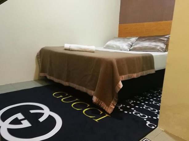 Imagen de la habitación del Hotel OYO 90762 Fs Dimensi. Foto 8