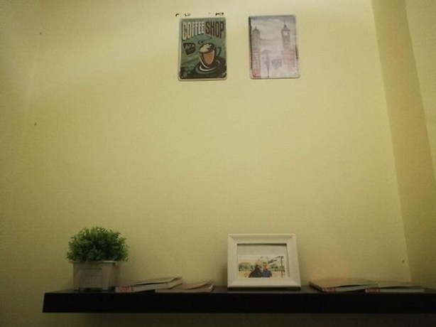 Imagen de la habitación del Hotel OYO 90762 Fs Dimensi. Foto 13