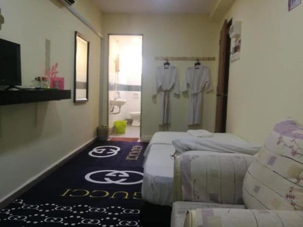 Imagen de la habitación del Hotel OYO 90762 Fs Dimensi. Foto 14