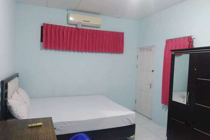 Imagen de la habitación del Hotel OYO 90766 Gardenia Boarding House. Foto 14