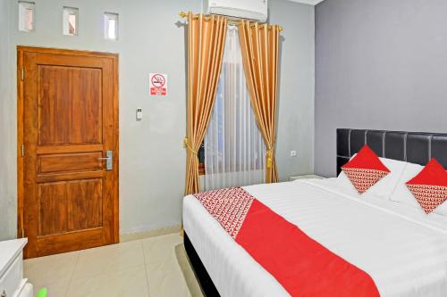 Imagen general del Hotel OYO 90767 Gm Guest House. Foto 13