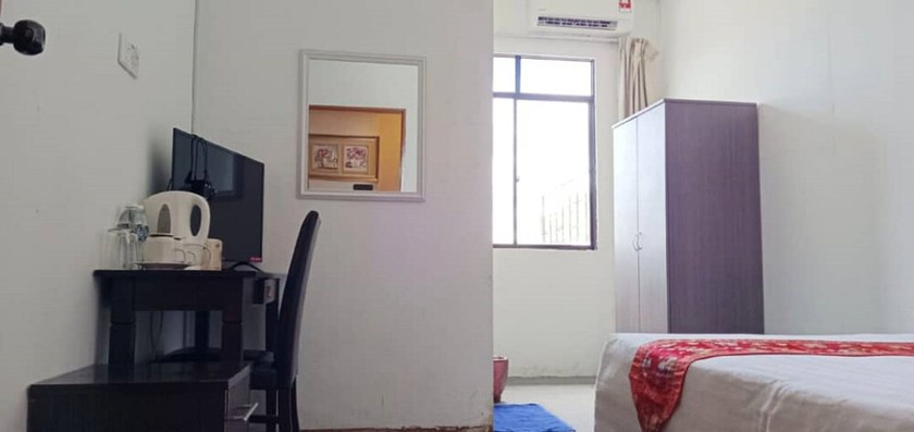 Imagen de la habitación del Hotel OYO 90785 Pandan. Foto 2