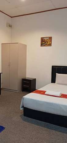Imagen de la habitación del Hotel OYO 90785 Pandan. Foto 11