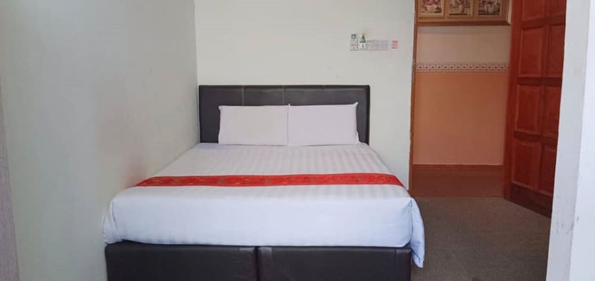 Imagen de la habitación del Hotel OYO 90785 Pandan. Foto 17