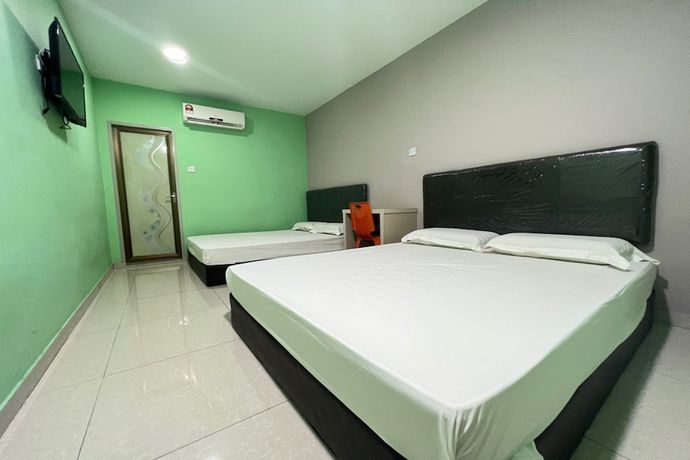 Imagen de la habitación del Hotel OYO 90789 Stutong Point. Foto 2