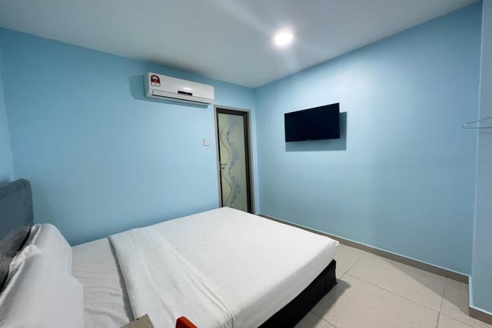 Imagen de la habitación del Hotel OYO 90789 Stutong Point. Foto 6