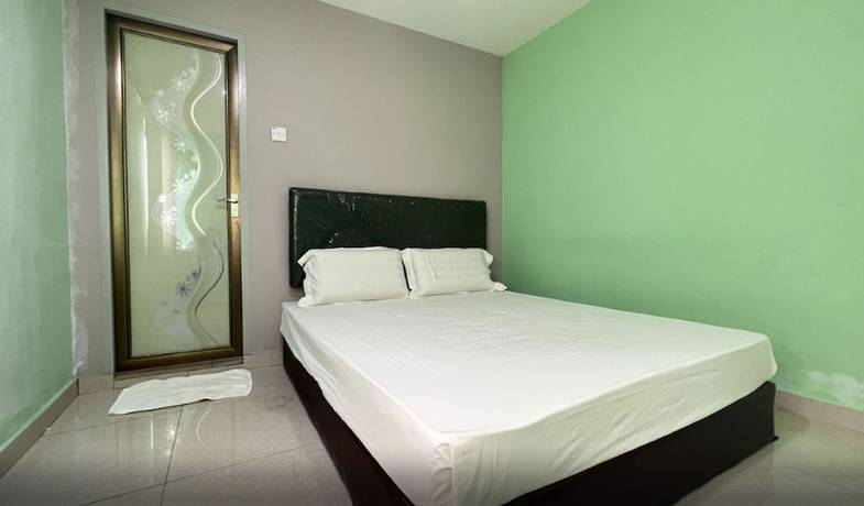 Imagen de la habitación del Hotel OYO 90789 Stutong Point. Foto 8
