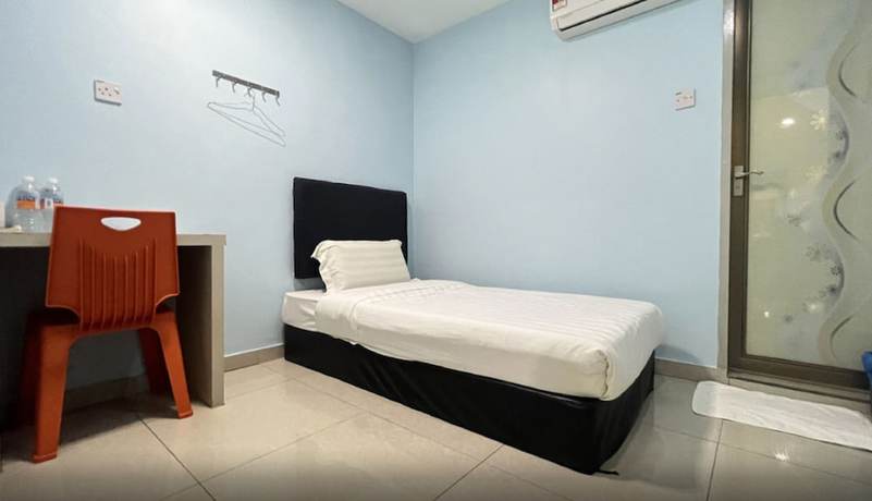 Imagen de la habitación del Hotel OYO 90789 Stutong Point. Foto 9
