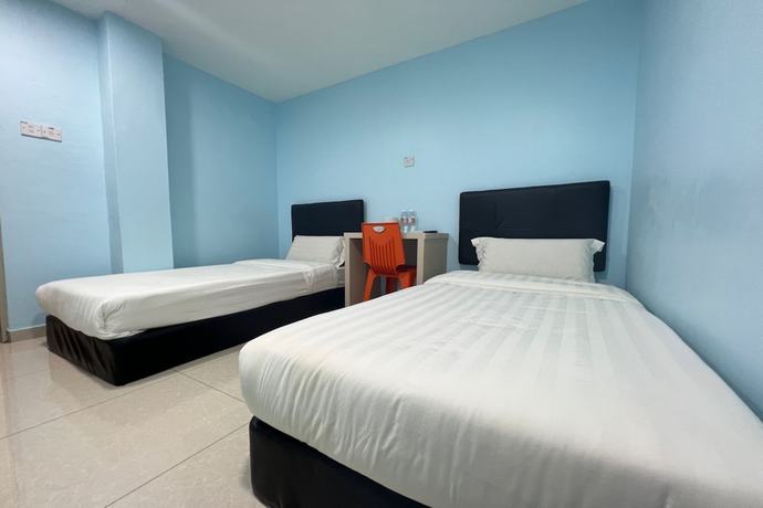 Imagen de la habitación del Hotel OYO 90789 Stutong Point. Foto 11