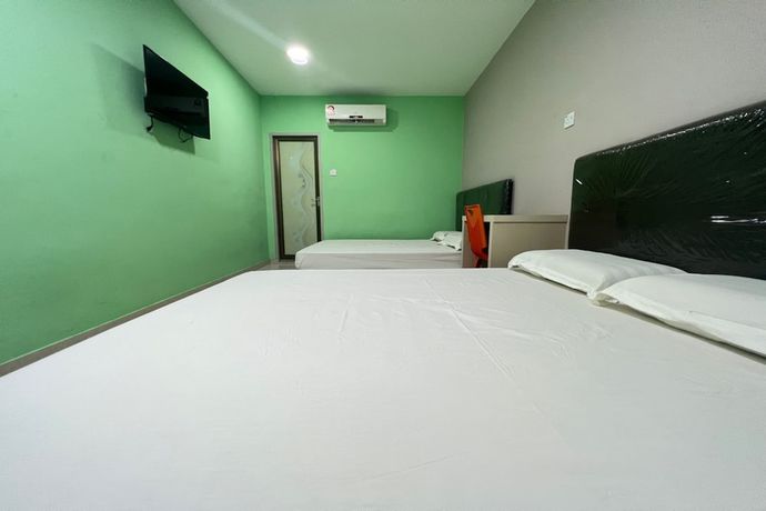 Imagen de la habitación del Hotel OYO 90789 Stutong Point. Foto 12