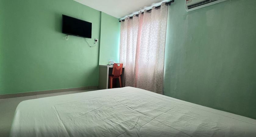Imagen de la habitación del Hotel OYO 90789 Stutong Point. Foto 13