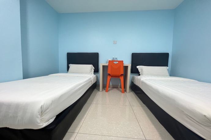 Imagen de la habitación del Hotel OYO 90789 Stutong Point. Foto 15